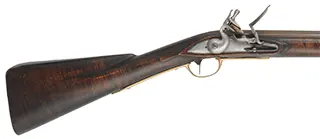 American Fowling Gun,
20 gauge, 44" octagon-to-round barrel,
Chambers' round faced English fowler flintlock,
dark stained maple, brass & iron trim,
used, signed by J. Alford